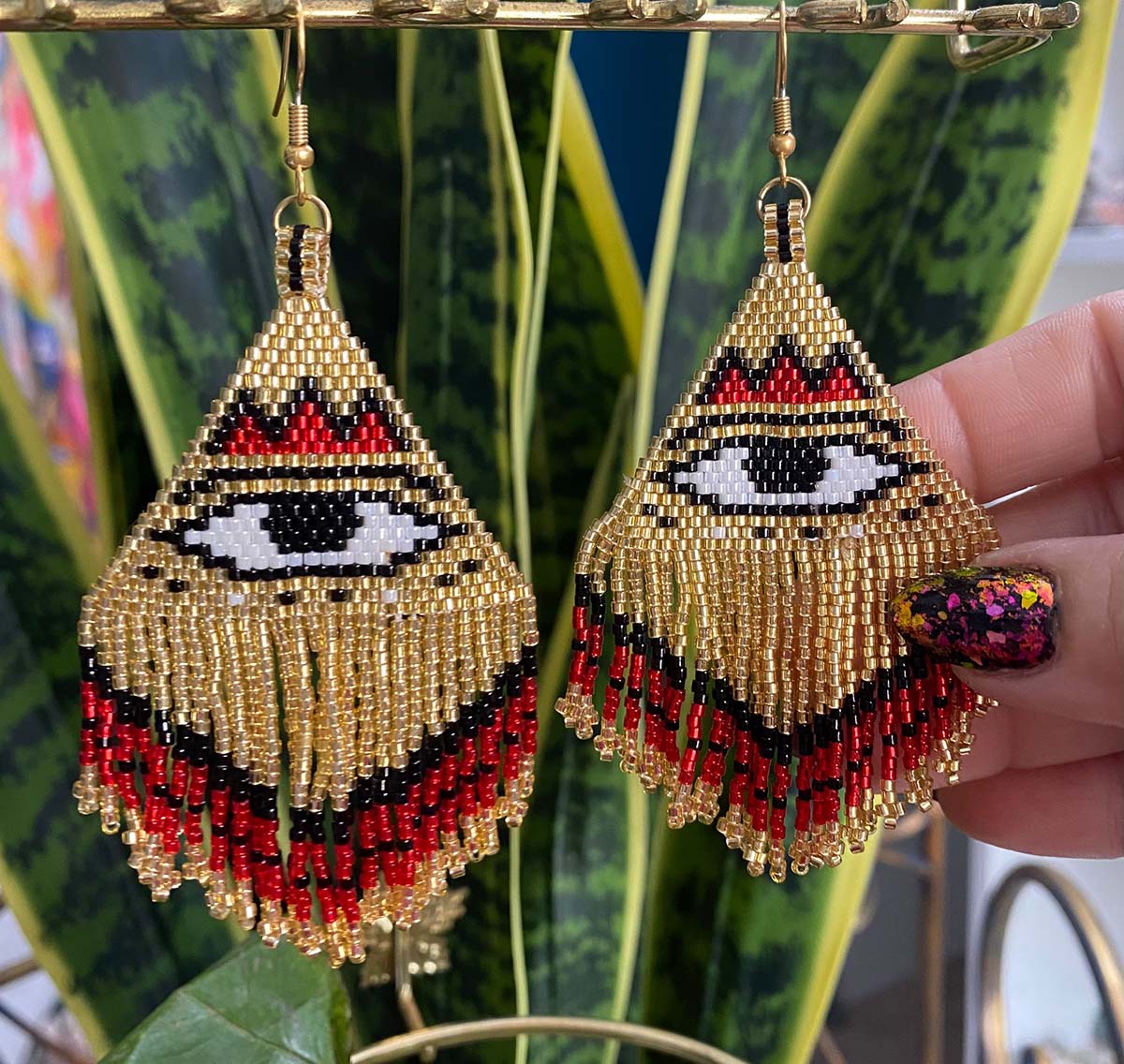 RED PROTECTION EYE EARRINGS