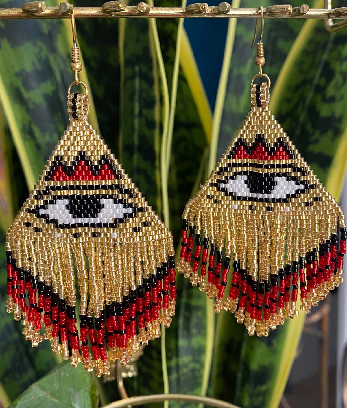 RED PROTECTION EYE EARRINGS
