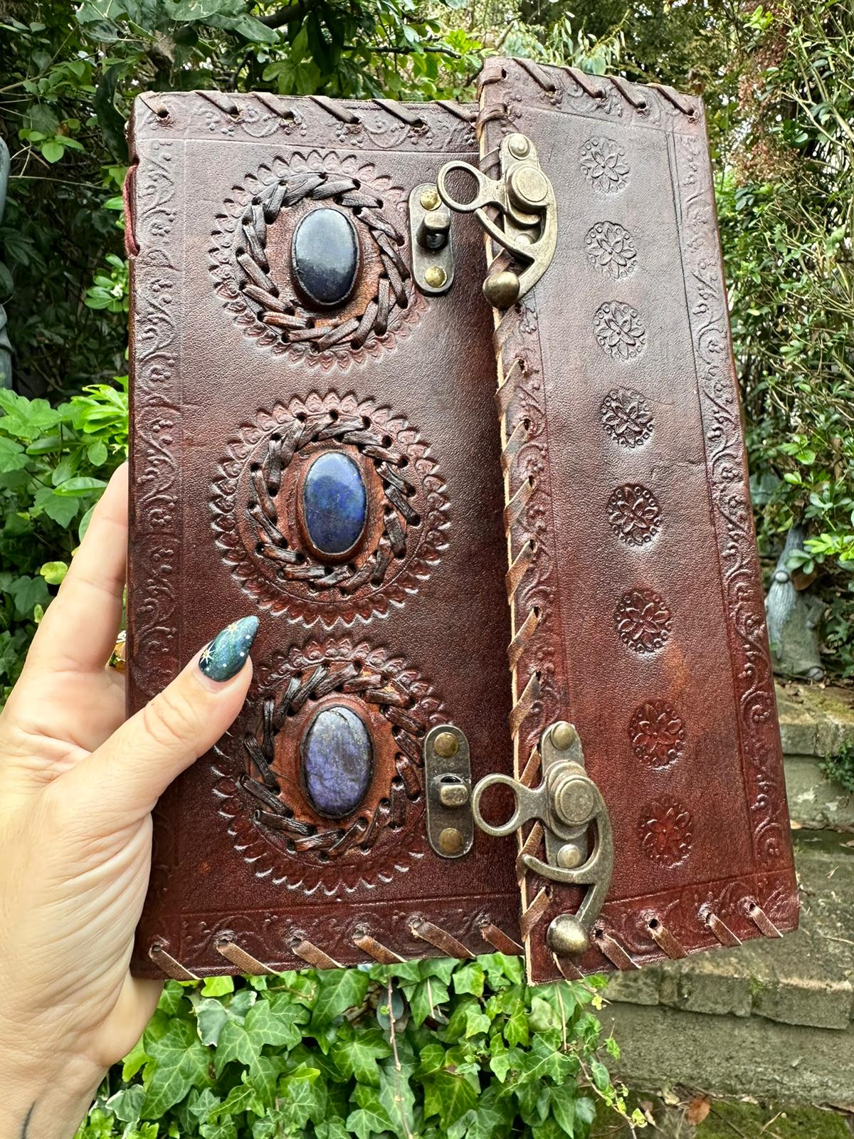 Brown Leather Journal With Three lapis lazuli Stones These Beautiful keepsake Crystal Journals with lock are made with leather and have three lapis lazuli Crystals in the centre. They can be used in the office, you can wright all your inspirations, poetry, photo memories and so much more. They make wonderful gifts for any occasion.