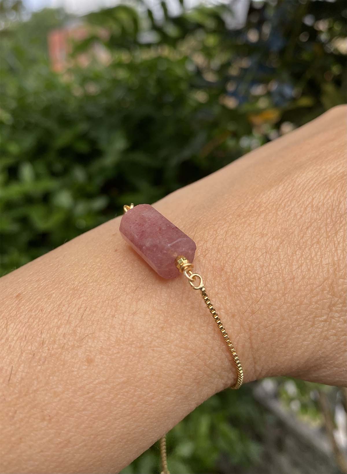 Natural Strawberry Quartz Gem Cylinder stone on a Gold  pull-chain Bracelet  Our Beautiful Gold plated adjustable Pull-chain bracelets are so elegant and delicate for all Occasions. We have chosen a variety of the most powerful Gemstones and created little Cylinders to sit perfectly on your wrist. They are very special pieces of jewellery and also make exquisite gifts.  Strawberry Quartz-
